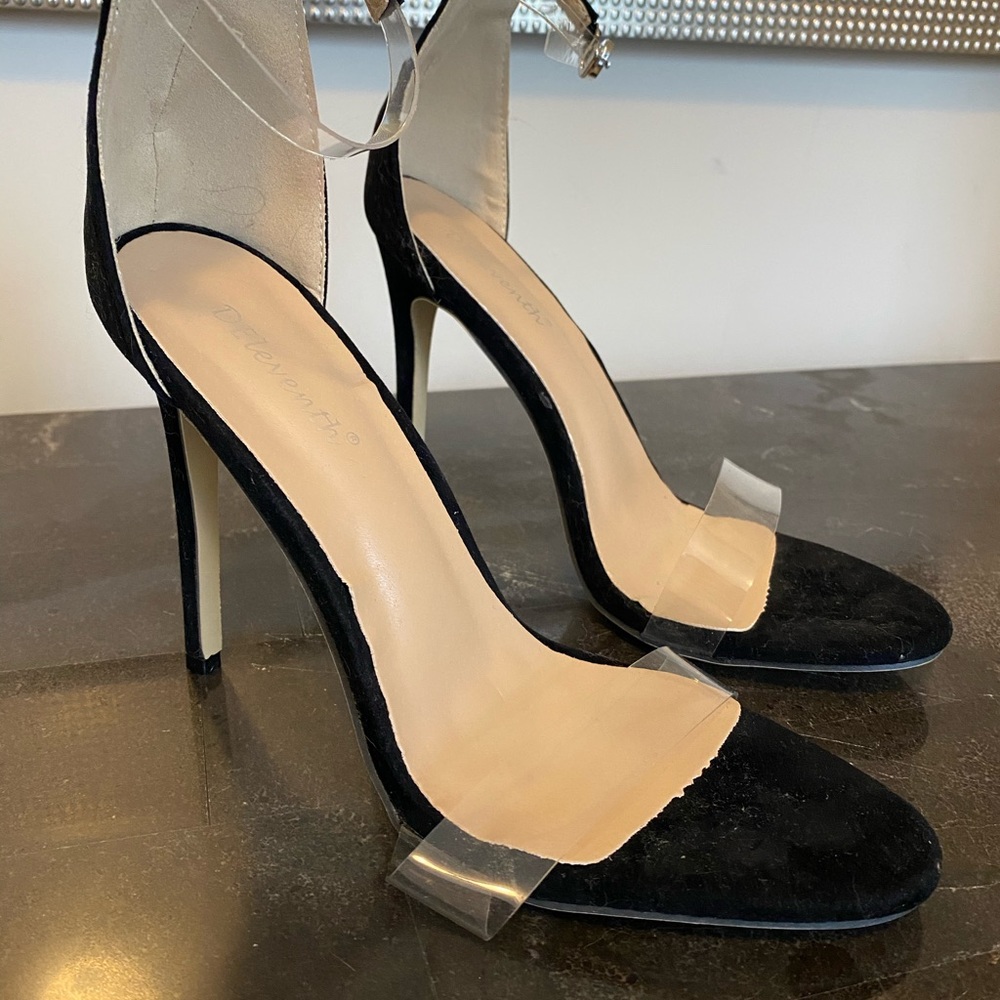 Black and clear pumps